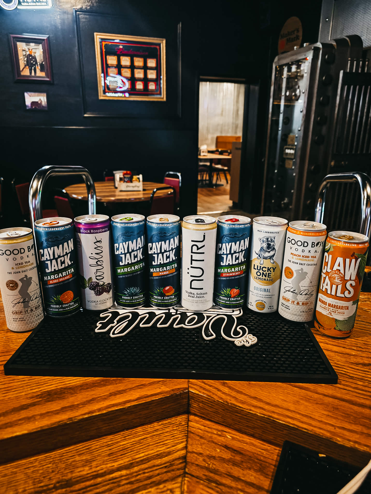 Canned cocktail selection — Good Boy Vodka, Cayman Jack Margarita, Carbliss, NÜTRL, Lucky One Lemonade, Claw Tails