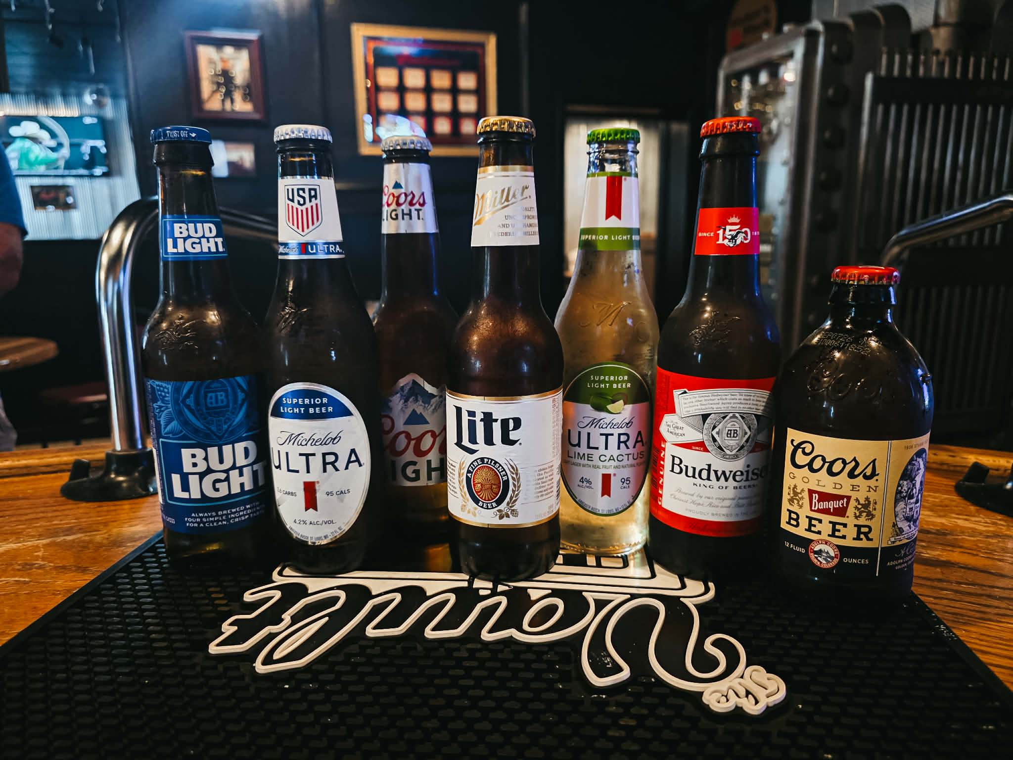 Domestic beer bottles — Bud Light, Michelob Ultra, Coors Light, Miller Lite, Budweiser